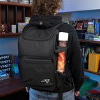 TCG backpack in black — strap and back panel